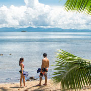 Couple looking out onto the ocean