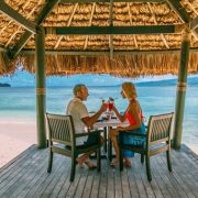 Couple by the beach in Qamea on Romantic Fiji Vacation for two