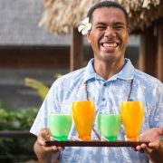 Tropical cocktails served by Fiji resort staff