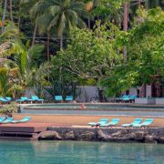 Resort pool surrounded in tropical forest