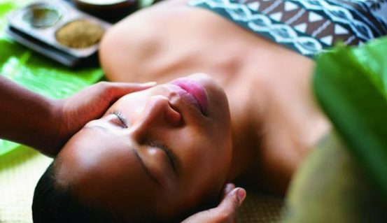 Woman enjoying Fijian spa